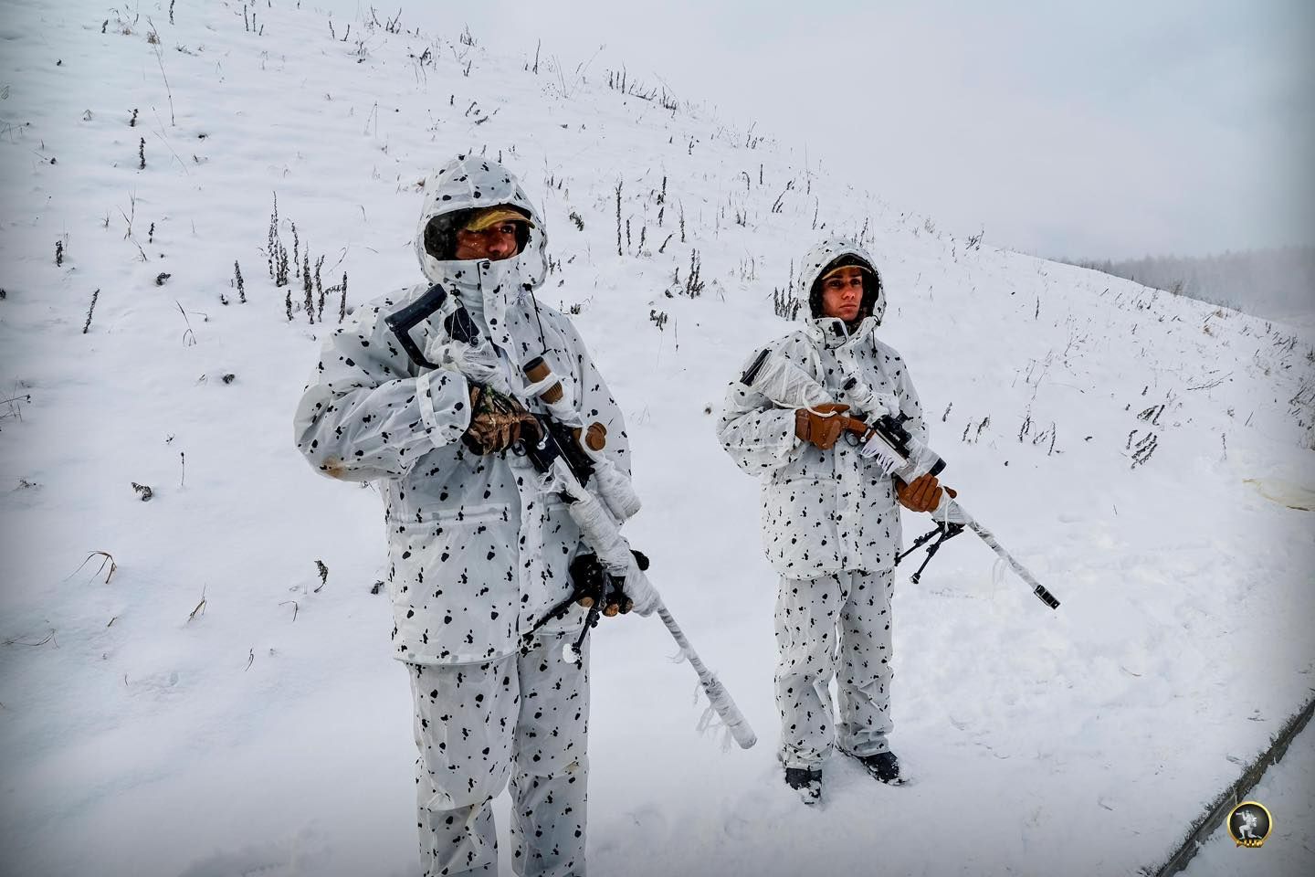 May be an image of 2 people, people skiing and arctic